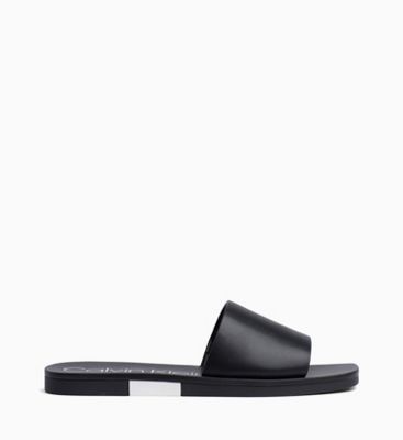 women's black calvin klein sliders