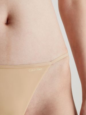 Calvin Klein Women's Sleek Model Thong Panty, Bare, Medium