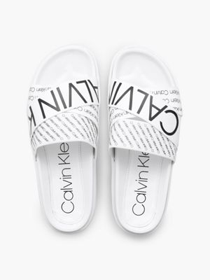 white calvin klein sliders womens