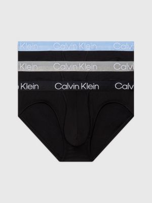 Calvin Klein Underwear Men's Solid Bright Red Mid-Rise Hip Brief Regular  (NB2539XU9 Extra Large) : : Fashion