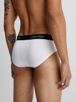 Man gets Calvin Klein underwear tattoo on hips to look like he's wearing  them
