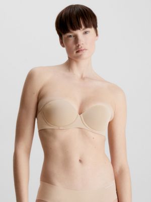 Calvin Klein Women's Seductive Comfort Lift Strapless Multiway Bra, Bare,  32D : : Clothing, Shoes & Accessories