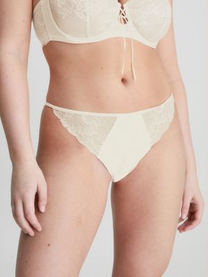 Calvin Klein Stralende katoenen string voor dames, Oranje, L : :  Kleding, schoenen & sieraden