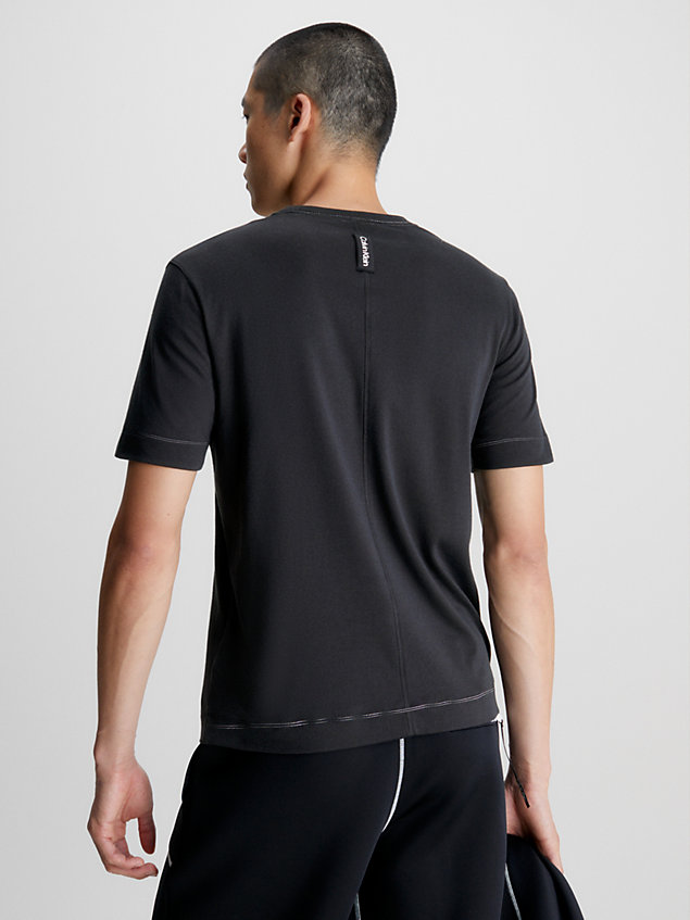 black t-shirt sportowy z logo dla mężczyźni - ck performance