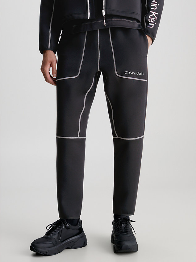 black spodnie dresowe z przeszyciami dla mężczyźni - ck performance