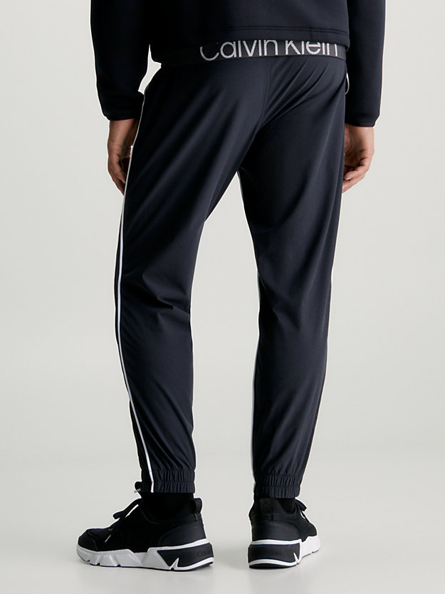 black beauty spodnie dresowe oversize dla mężczyźni - ck performance