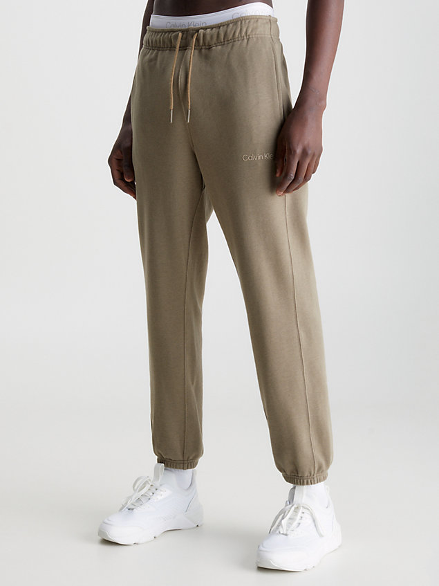 brown relaxed cotton terry joggers for men ck performance
