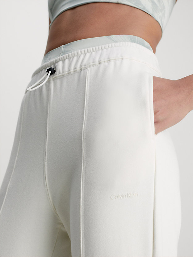 WHITE SUEDE Pantalon de jogging en tissu éponge de coton for femmes CK PERFORMANCE