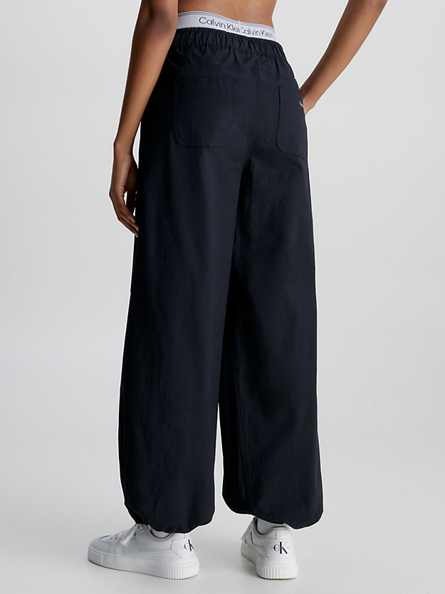 BLACK BEAUTY Wodoodporne spodnie z szerokimi nogawkami dla Kobiety CK PERFORMANCE