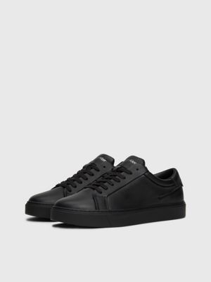 Calvin klein hotsell black leather trainers