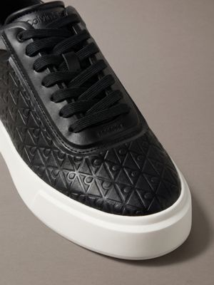 black/light grey embossed emblem logo trainers for men calvin klein