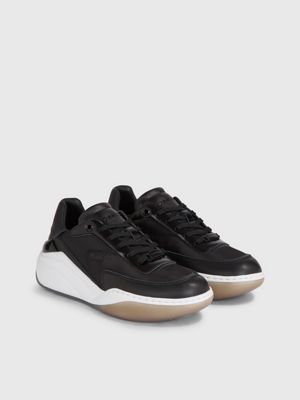 Calvin klein wedge outlet trainers