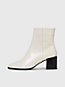 dk ecru leather heeled ankle logo boots for women calvin klein