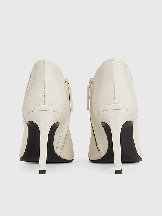 dk ecru leather stiletto logo boots for women calvin klein