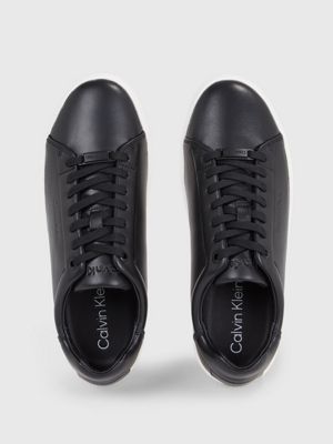 Women s black calvin hotsell klein trainers