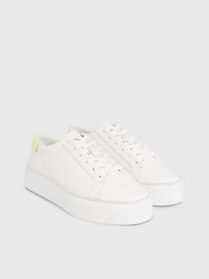 white/tender yellow logo platform trainers for women calvin klein