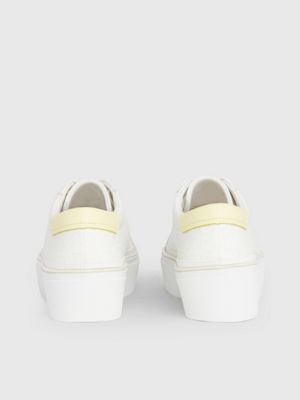 white/tender yellow logo platform trainers for women calvin klein