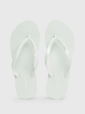 milky green flip flops for women calvin klein