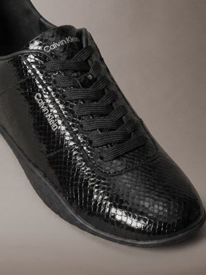 sneakers ballerina ibride con stampa serpente triple black da donne calvin klein