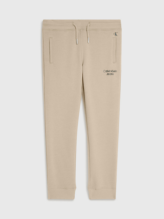 beige spodnie dresowe z bawełny frotte dla boys - calvin klein jeans