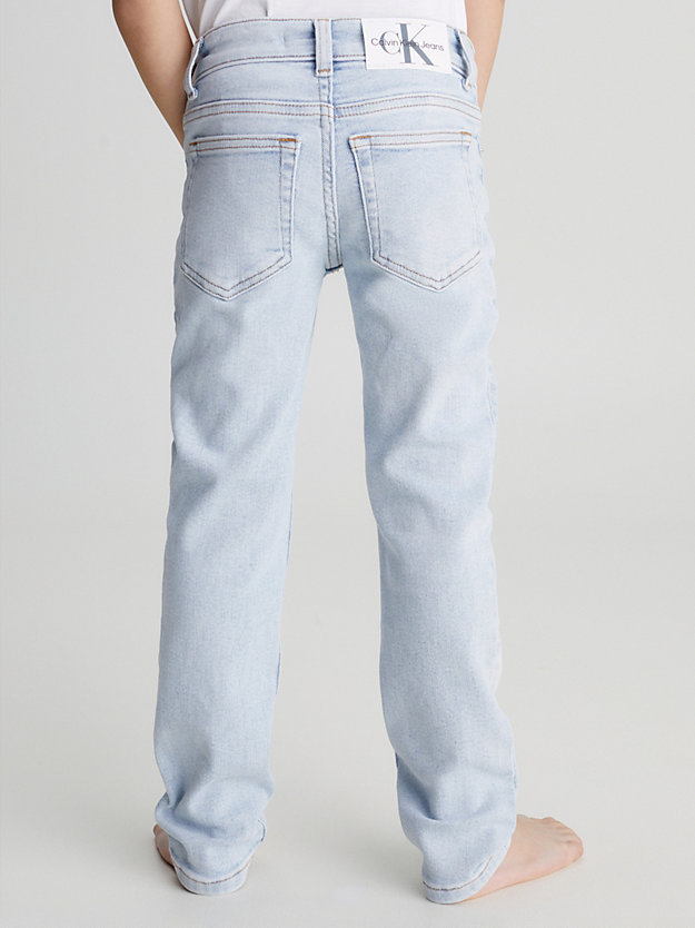light bleached stretch mid rise slim jeans for boys calvin klein jeans
