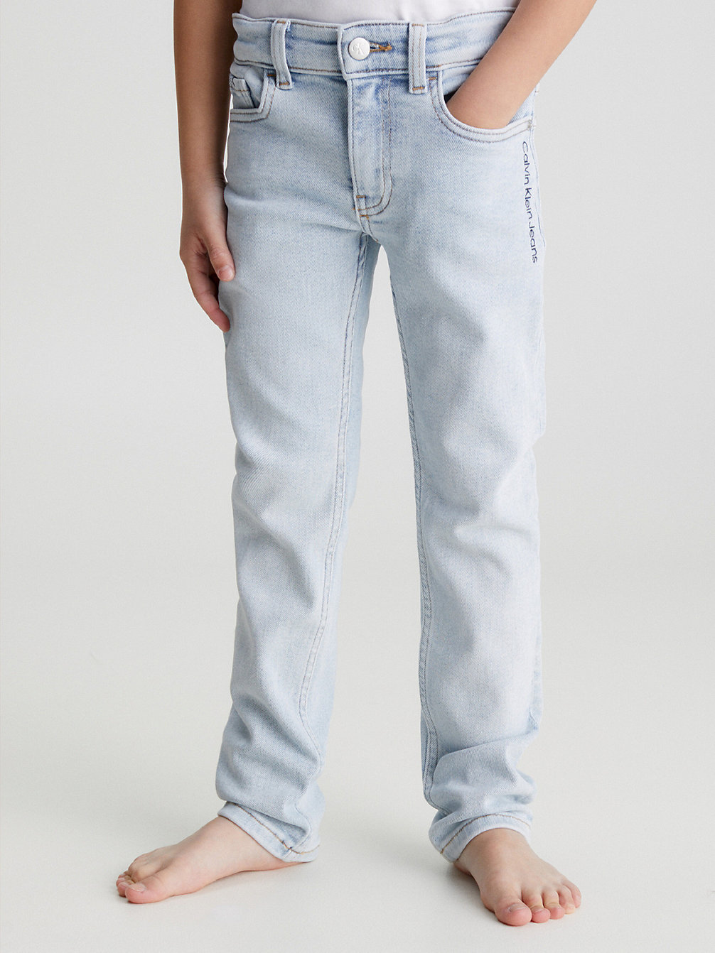LIGHT BLEACHED STRETCH Mid Rise Slim Jeans undefined boys Calvin Klein