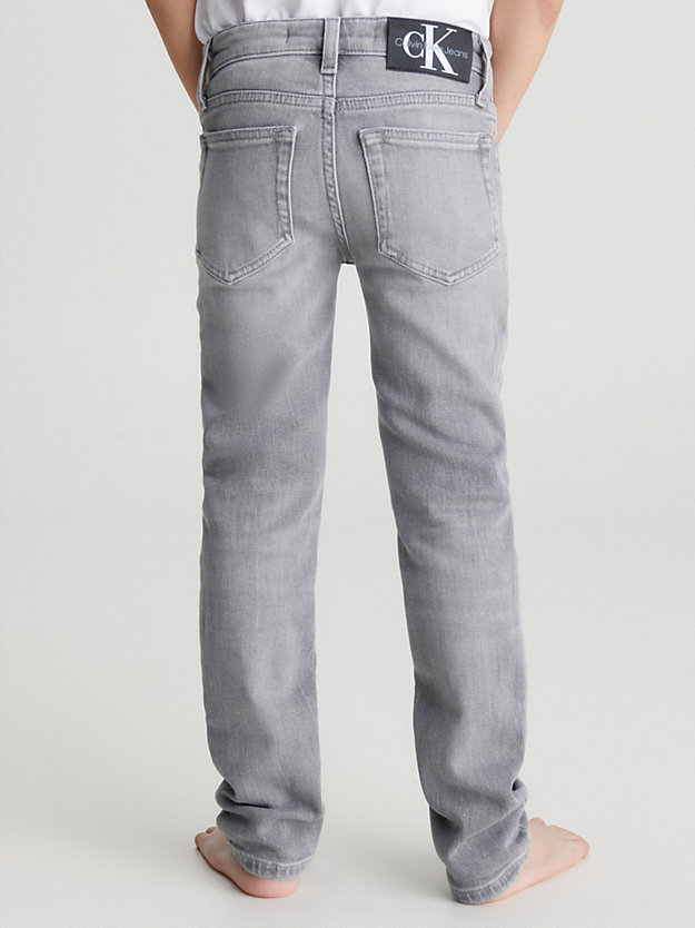 light grey mid rise slim jeans for boys calvin klein jeans