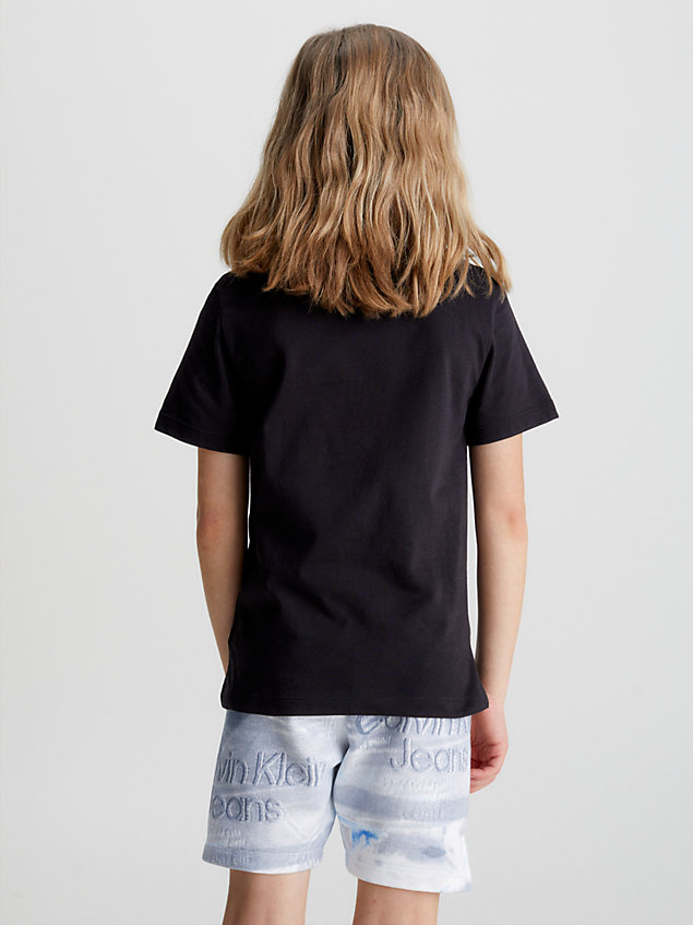 black t-shirt mit im dunkeln leuchtendem logo für jungen - calvin klein jeans