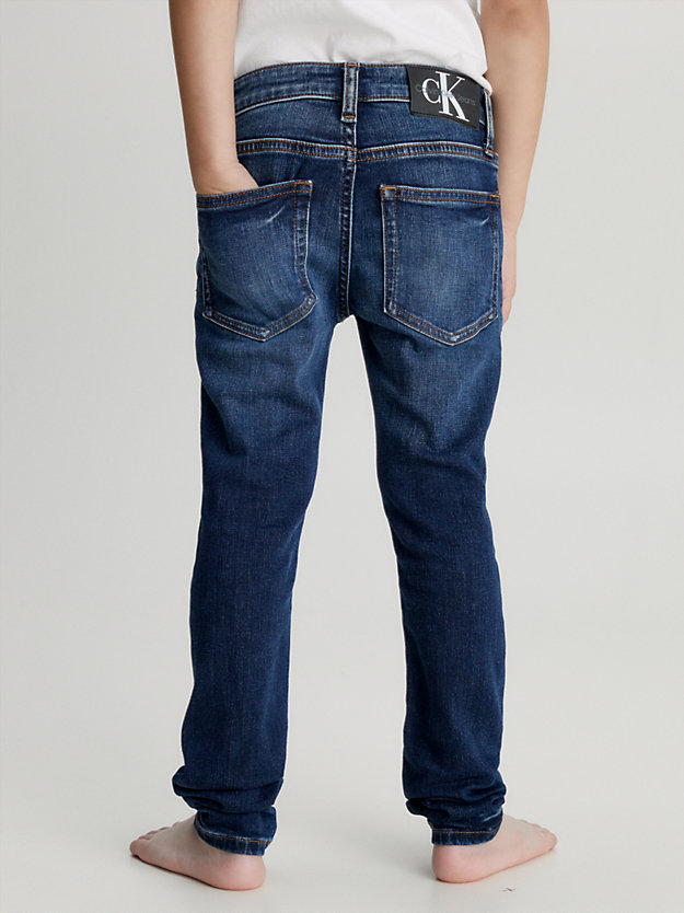 dark blue mid rise skinny jeans for boys calvin klein jeans