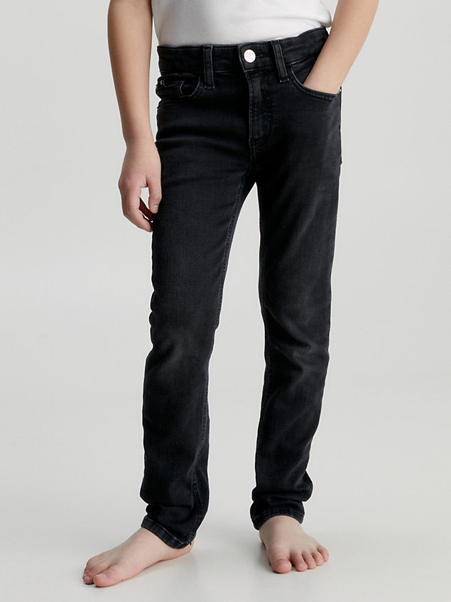 black mid rise slim jeans for boys calvin klein jeans