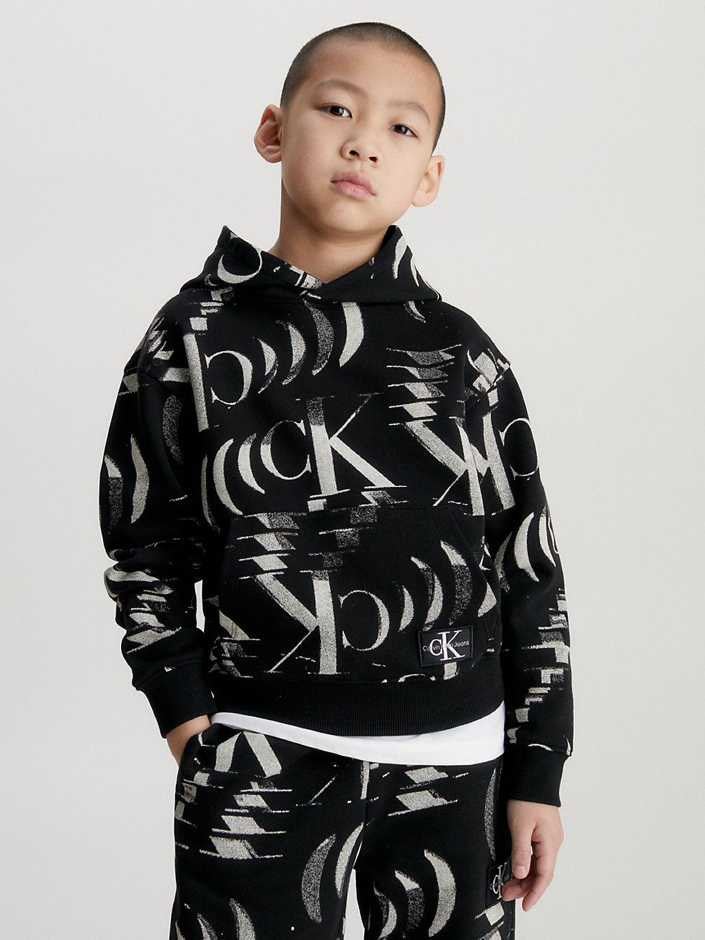 GLITCHED MONOGRAM AOP BLACK Relaxed Logo Hoodie undefined boys Calvin Klein