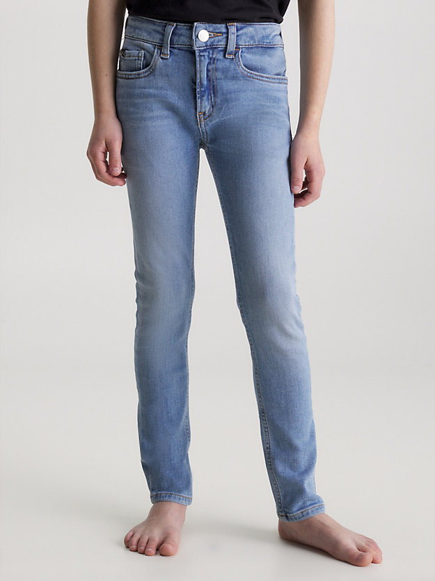 essential light blue mid rise skinny jeans for boys calvin klein jeans