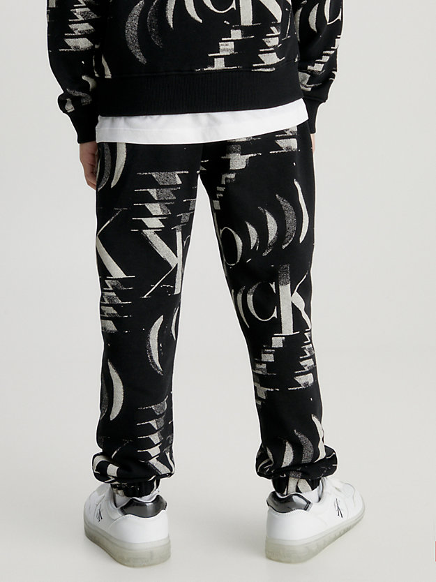 glitched monogram aop black relaxed logo joggers for boys calvin klein jeans