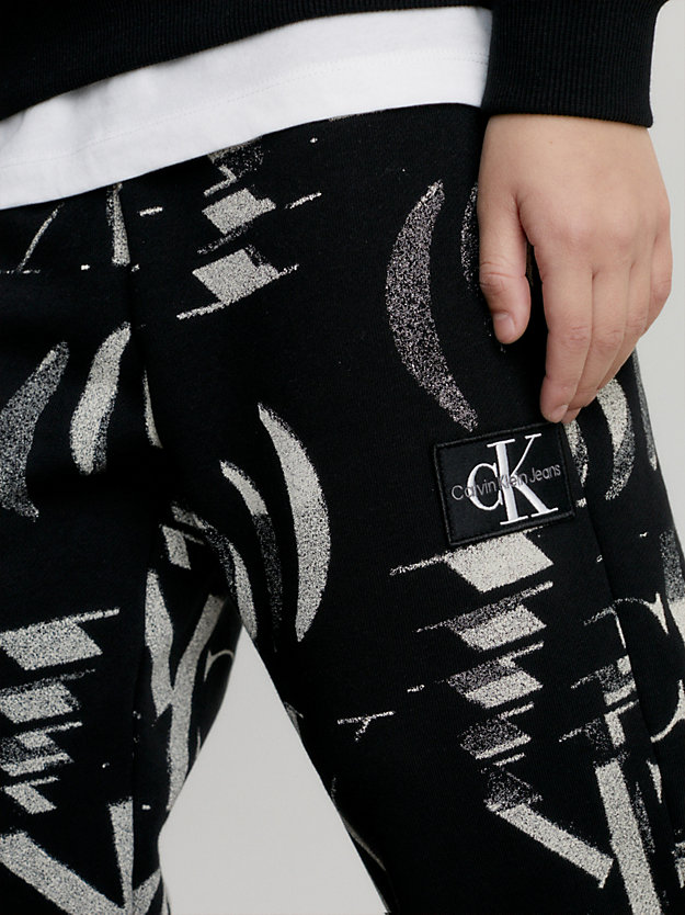 glitched monogram aop black relaxed logo joggers for boys calvin klein jeans