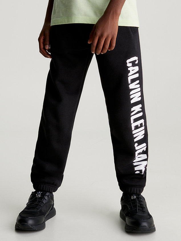 black swobodne spodnie dresowe z logo dla chłopcy - calvin klein jeans