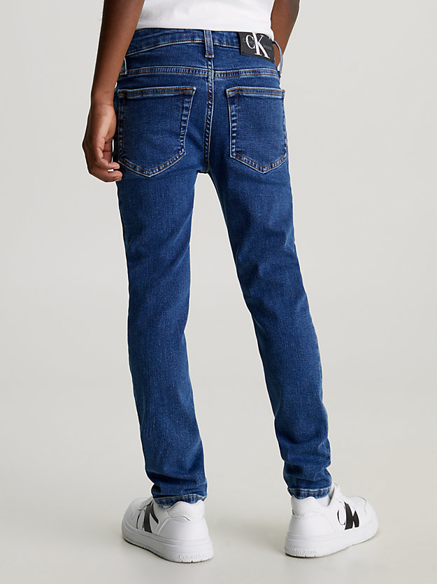 essential dark serene blue mid rise slim jeans for boys calvin klein jeans
