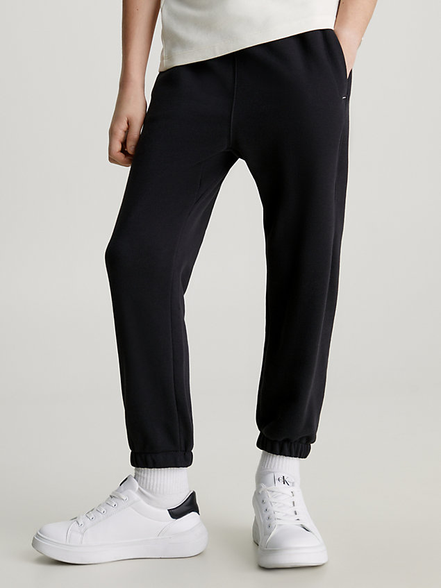 black spodnie dresowe z bawełny frotte dla chłopcy - calvin klein jeans
