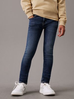 blue mid rise skinny jeans for boys calvin klein jeans