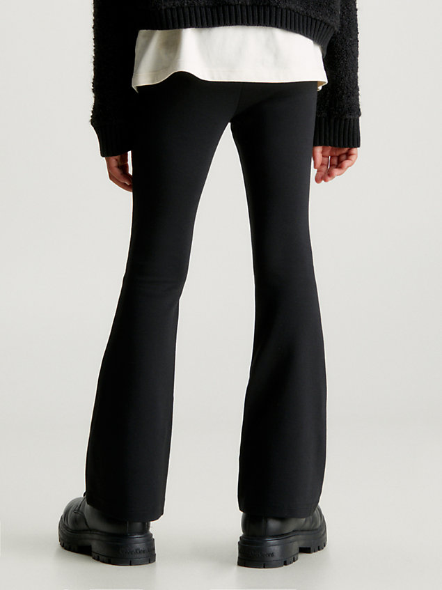black rozszerzane spodnie z logo dla dziewczynki - calvin klein jeans