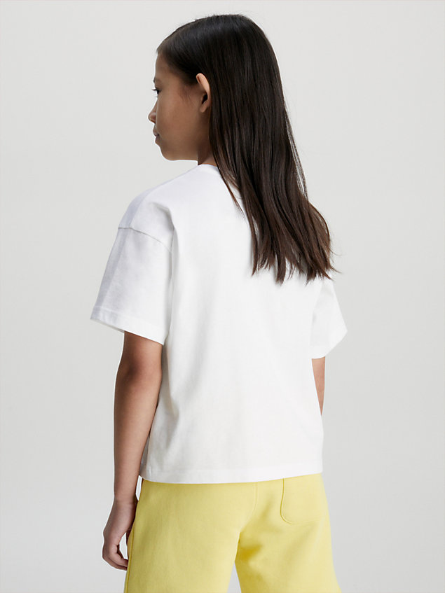 white boxy t-shirt met grafisch logo voor meisjes - calvin klein jeans