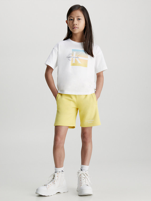white boxy logo graphic t-shirt for girls calvin klein jeans