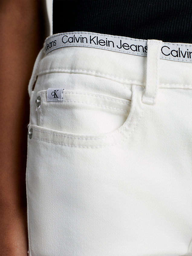 white mid rise flared jeans for girls calvin klein jeans
