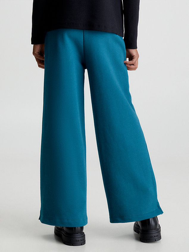 blue spodnie dresowe z szerokimi nogawkami dla dziewczynki - calvin klein jeans