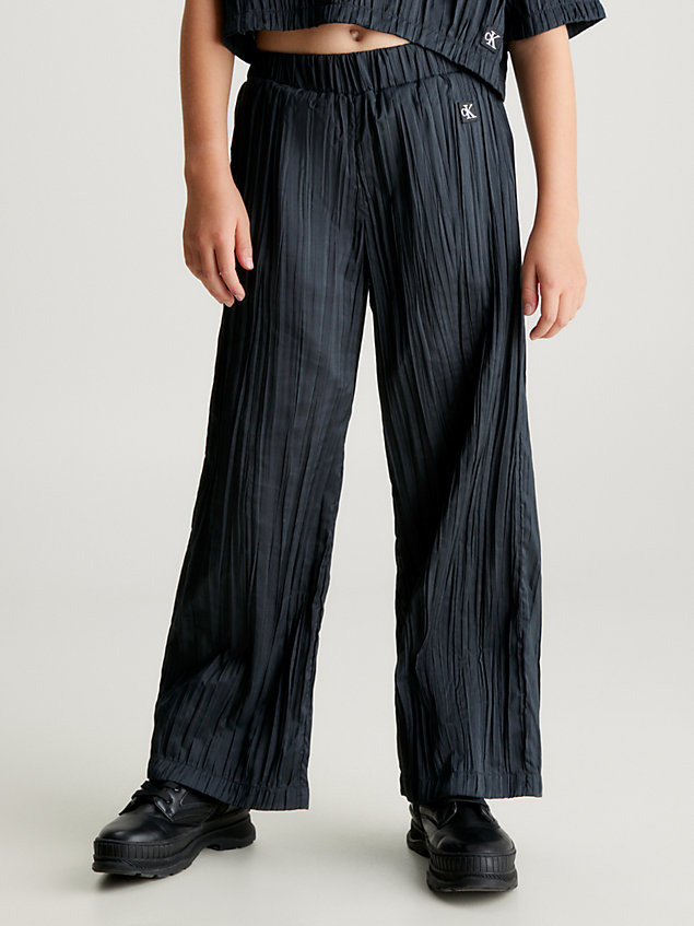 black plisowane spodnie z szerokimi nogawkami dla dziewczynki - calvin klein jeans