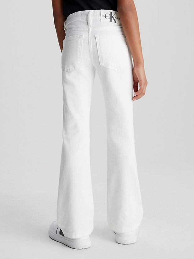 white denim jeansy mid rise flared dla dziewczynki - calvin klein jeans