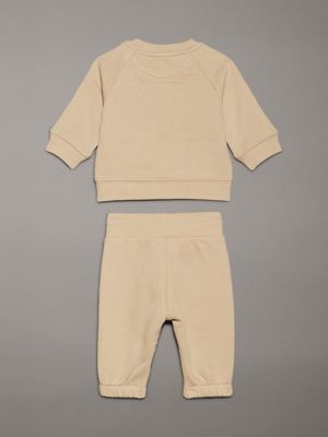 pale khaki newborn logo jogging suit for newborn calvin klein jeans