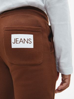 MILK CHOCOLATE Schmale Unisex-Jogginghose für kids unisex CALVIN KLEIN JEANS