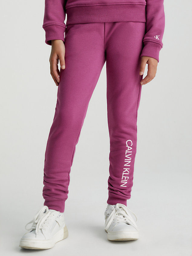 purple spodnie dresowe unisex, fason slim dla kids unisex - calvin klein jeans