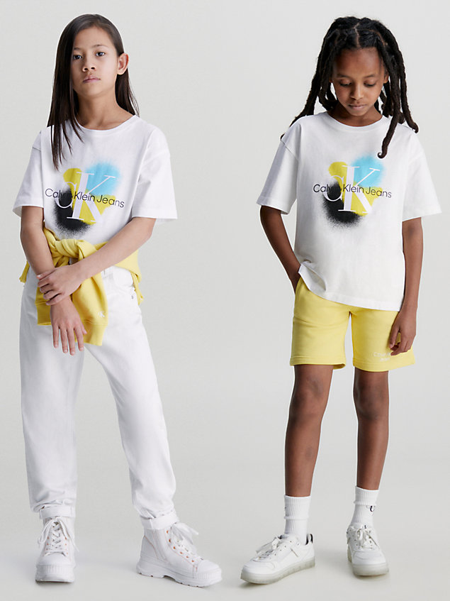 camiseta con estampado de spray unisex white de kids unisex calvin klein jeans