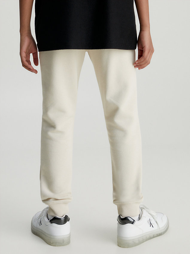 pantalón de chándal unisex con logo beige de kids unisex calvin klein jeans